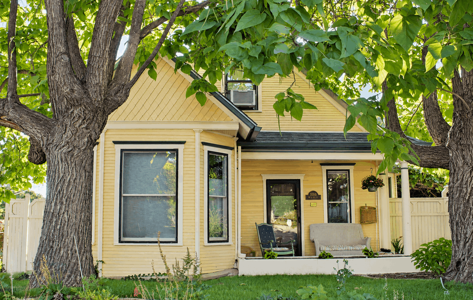 Historic residential home in Louisville Colorado showing roof and exterior construction