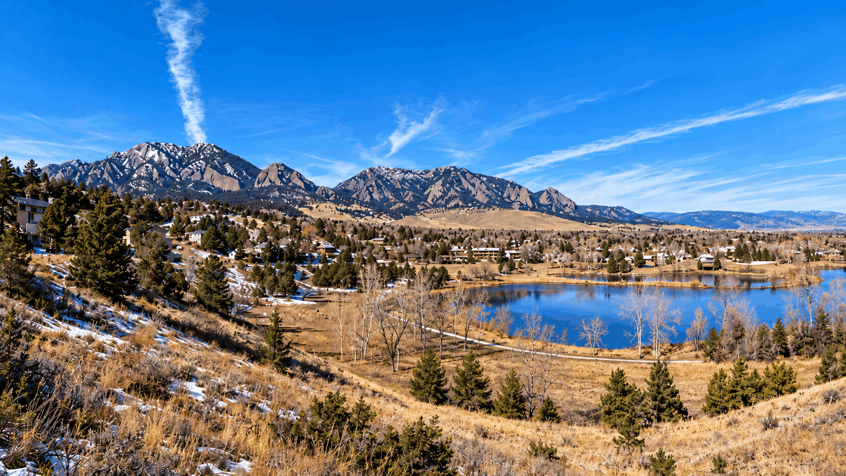 Wide panoramic view of Boulder Colorado and surrounding neighborhoods