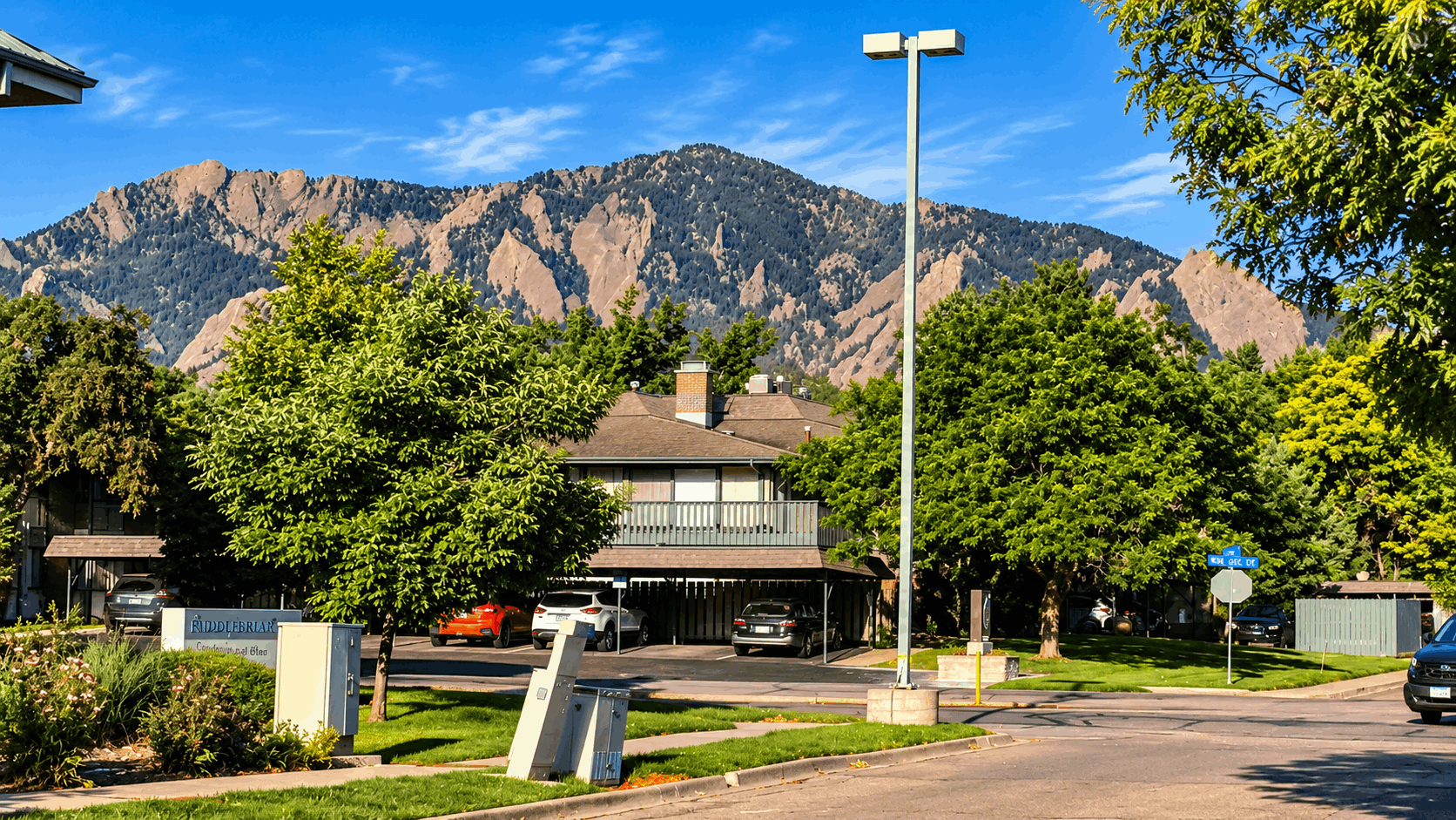 Residential street in East Boulder Colorado with the Flatirons in the background