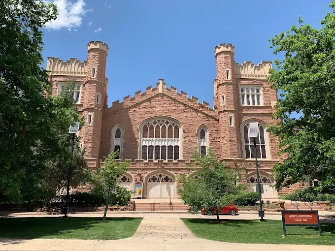 University of Colorado Boulder campus buildings set against the Flatirons, highlighting the Boulder, Colorado community and lifestyle.