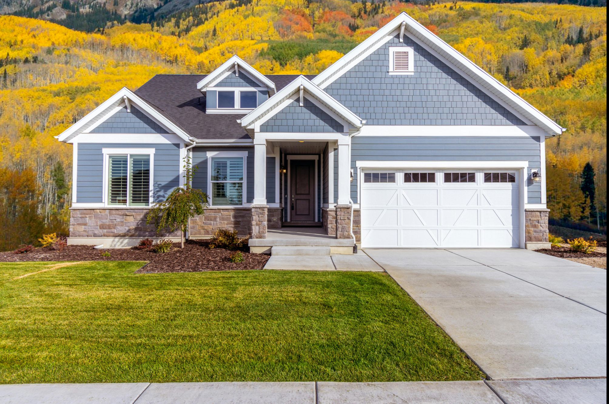 Well-prepared Boulder home exterior with landscaping that helps prevent a stale listing.
