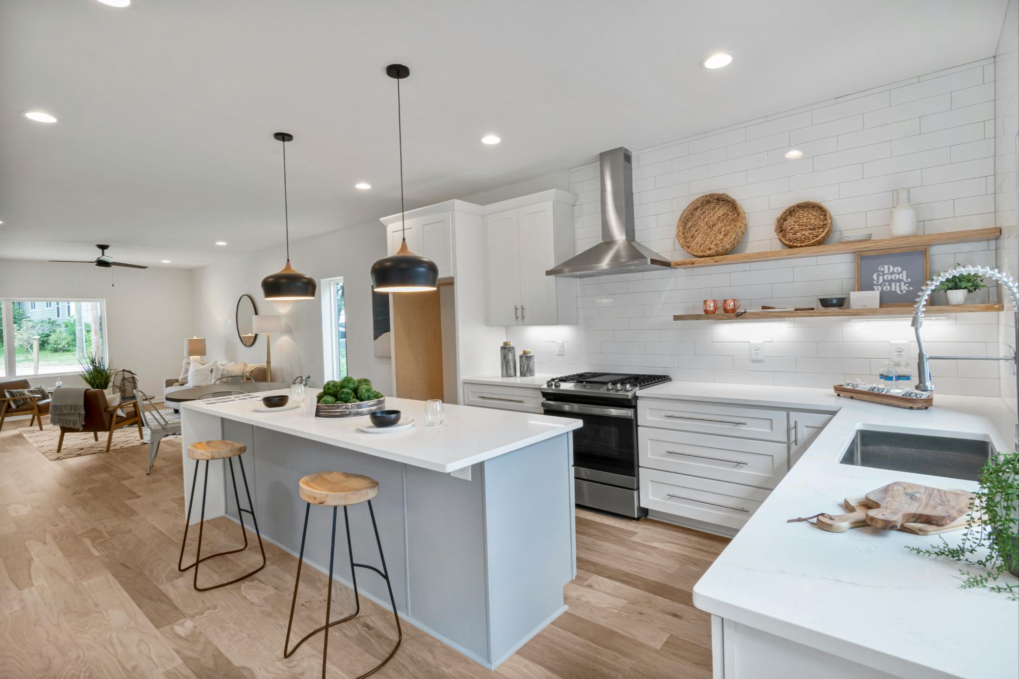 Contemporary Boulder CO kitchen with white cabinetry and open living space.