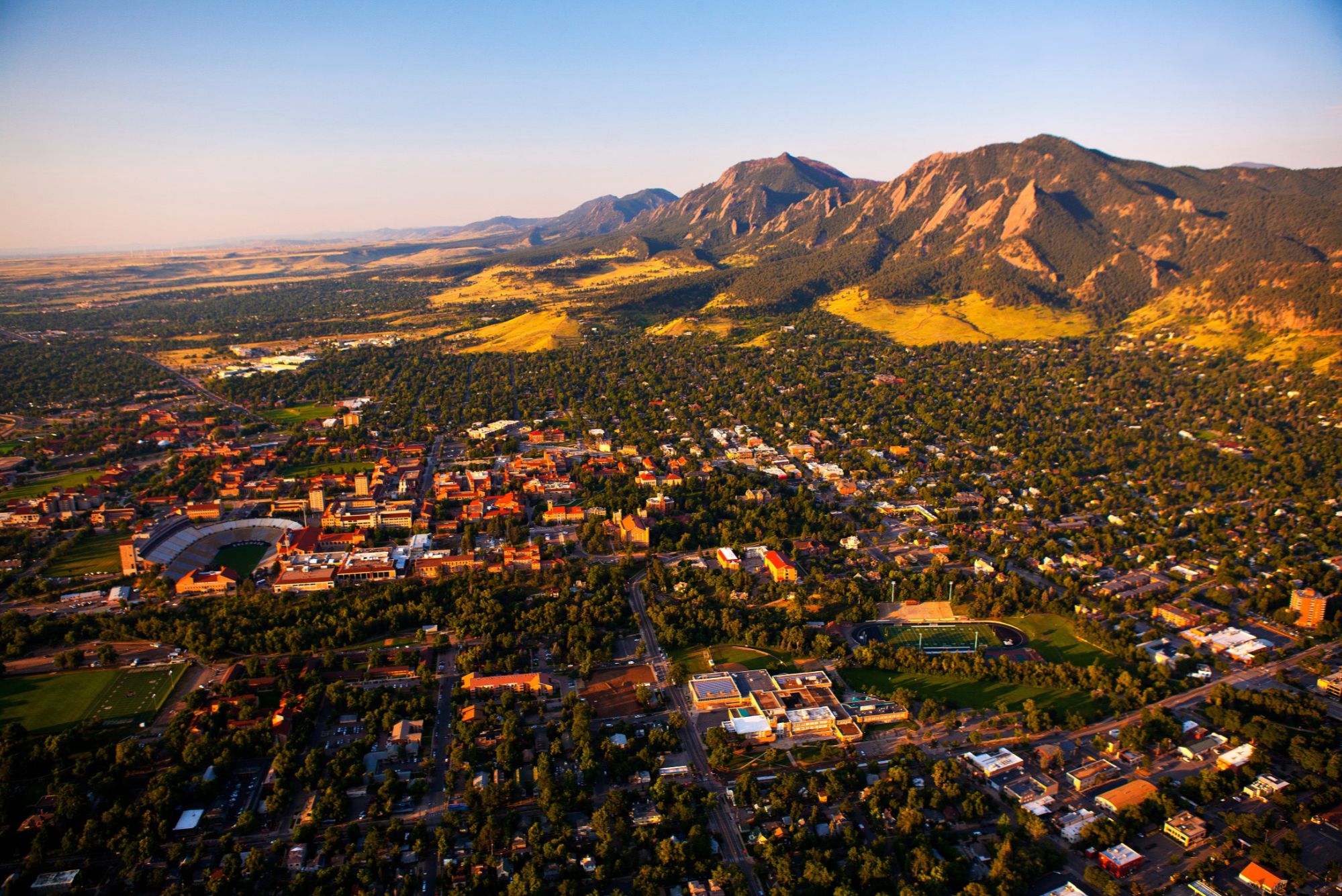 Downtown Boulder neighborhoods and mountain views tied to Sundance and Boulder real estate demand.