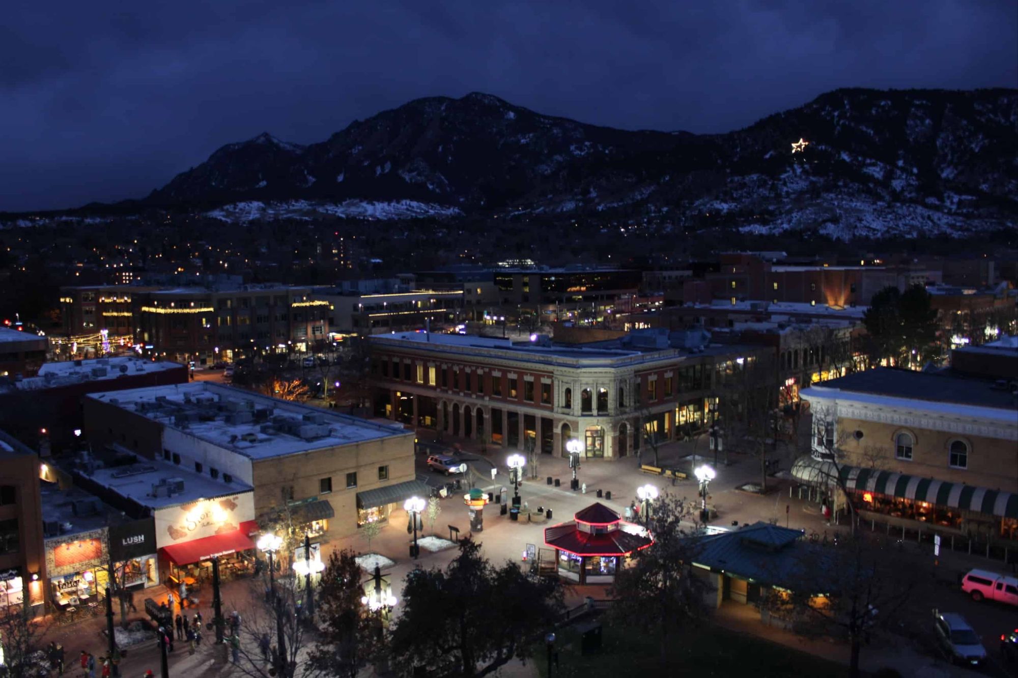 Festival-goers walking through downtown Boulder between BIFF venues near Pearl Street.