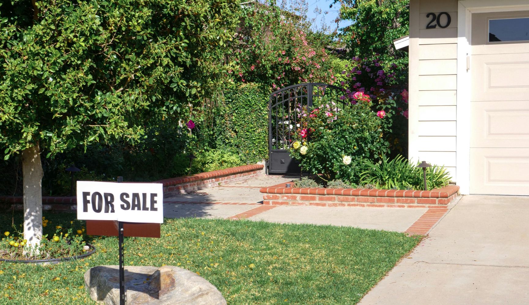 Boulder front yard sign, open-house prep scene, or a well-styled entry.