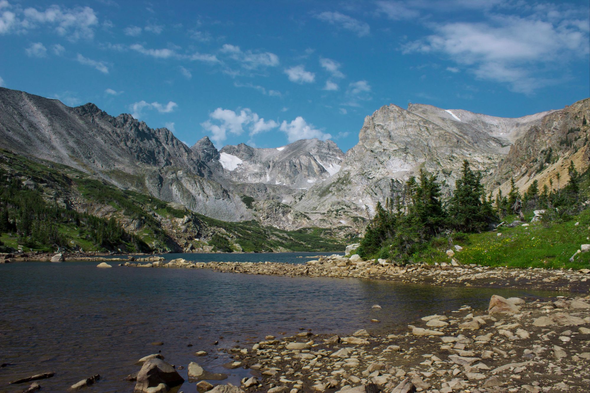 Lake Isabelle near Boulder, Colorado, with alpine water and mountain peaks in the Indian Peaks Wilderness.