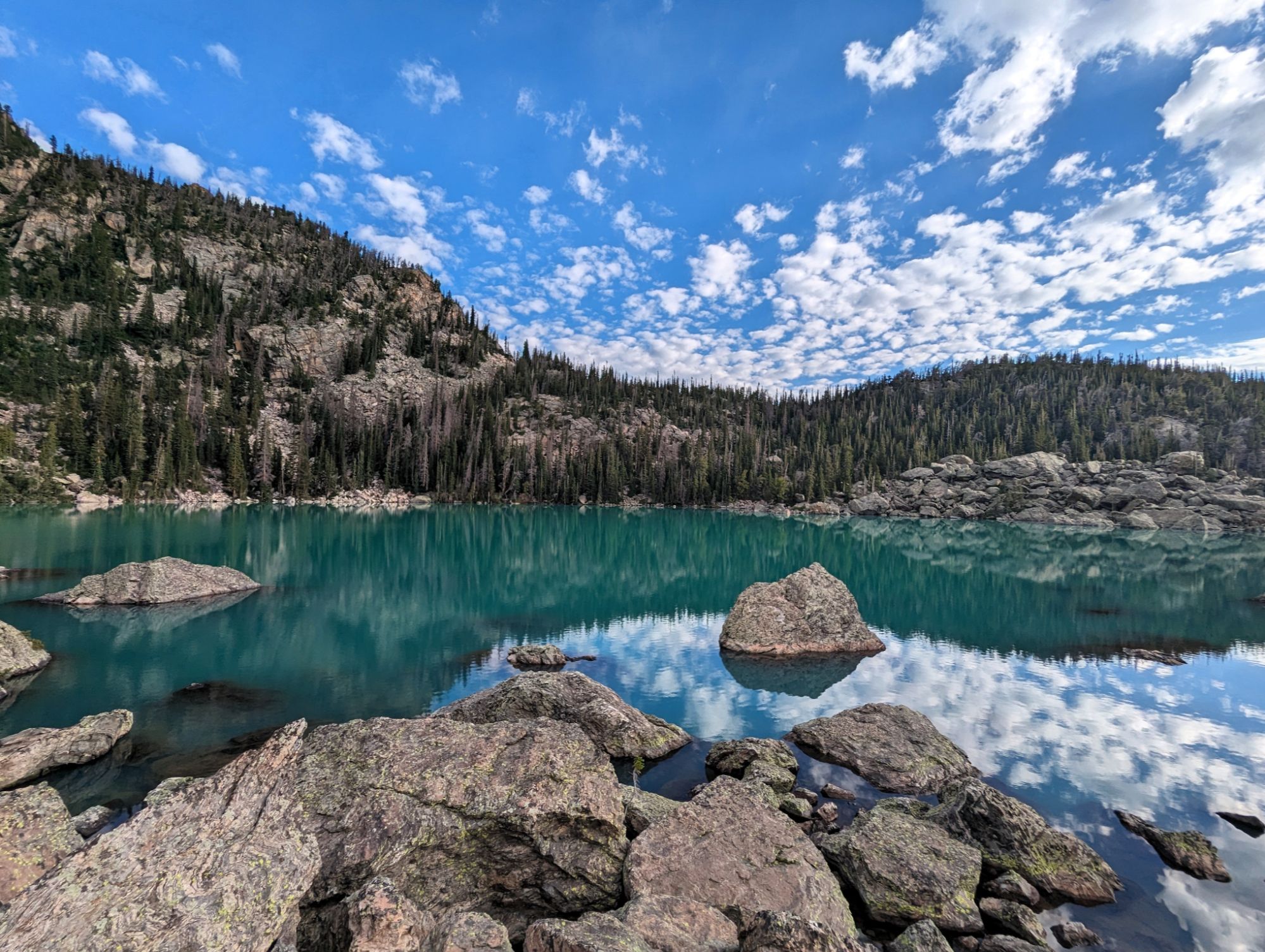 Lake Haiyaha in Rocky Mountain National Park with turquoise water and granite boulders near Boulder.