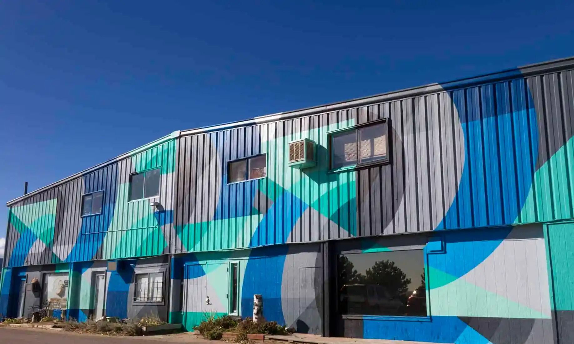 Emerald City green warehouse artist studios in the NoBo Art District along Broadway in North Boulder, Colorado