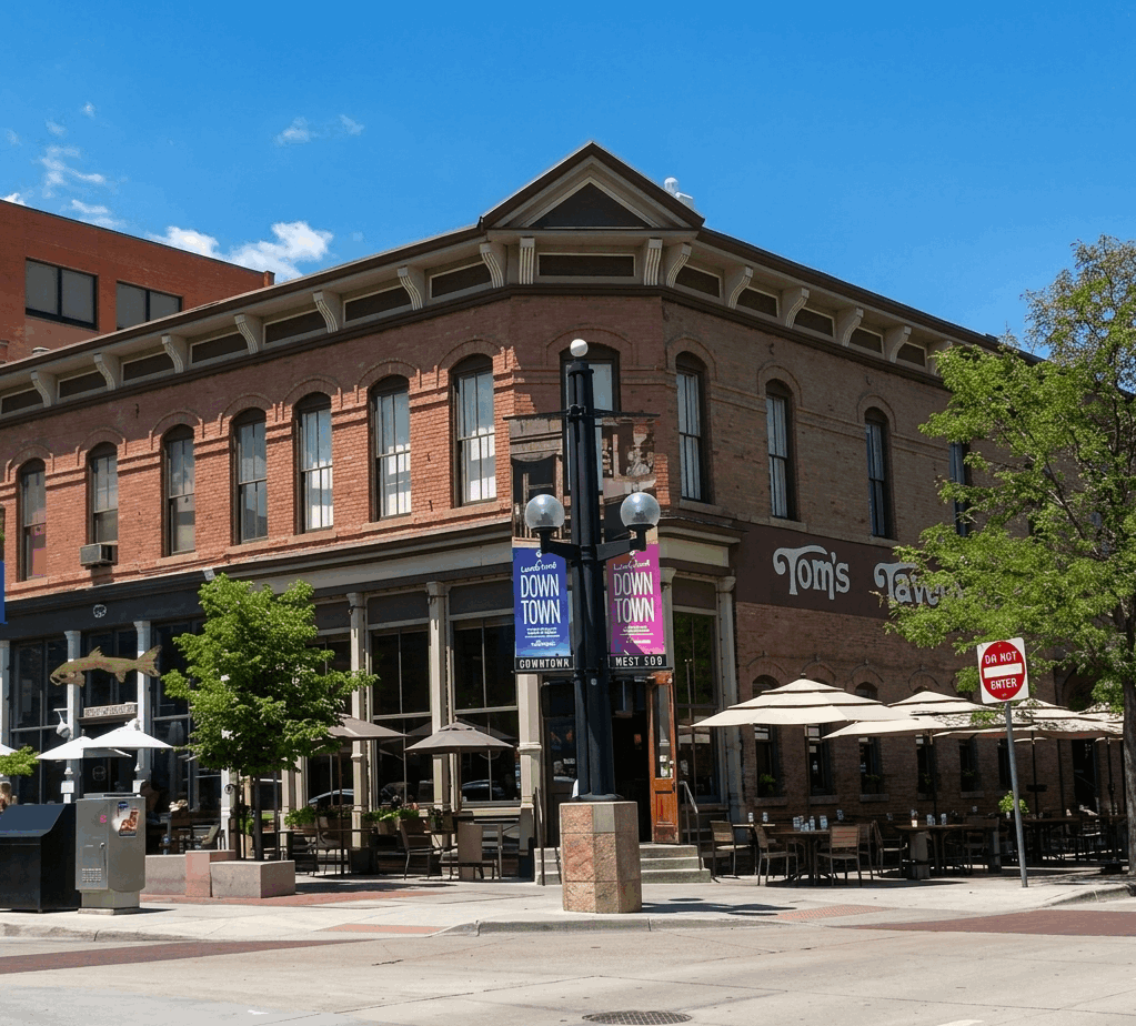 Pearl Street Mall outdoor pedestrian shopping and dining district in downtown Boulder, Colorado on a sunny day