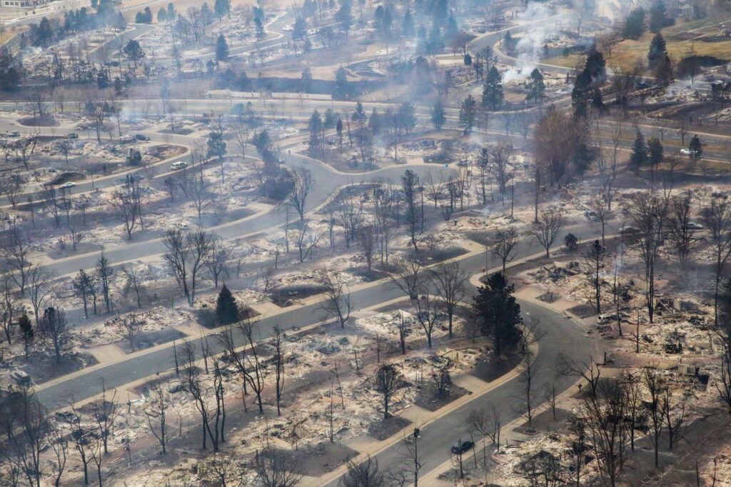 Aerial view of Marshall Fire aftermath in Superior and Louisville, Colorado, showing burned homes and residential neighborhoods in Boulder County December 2021