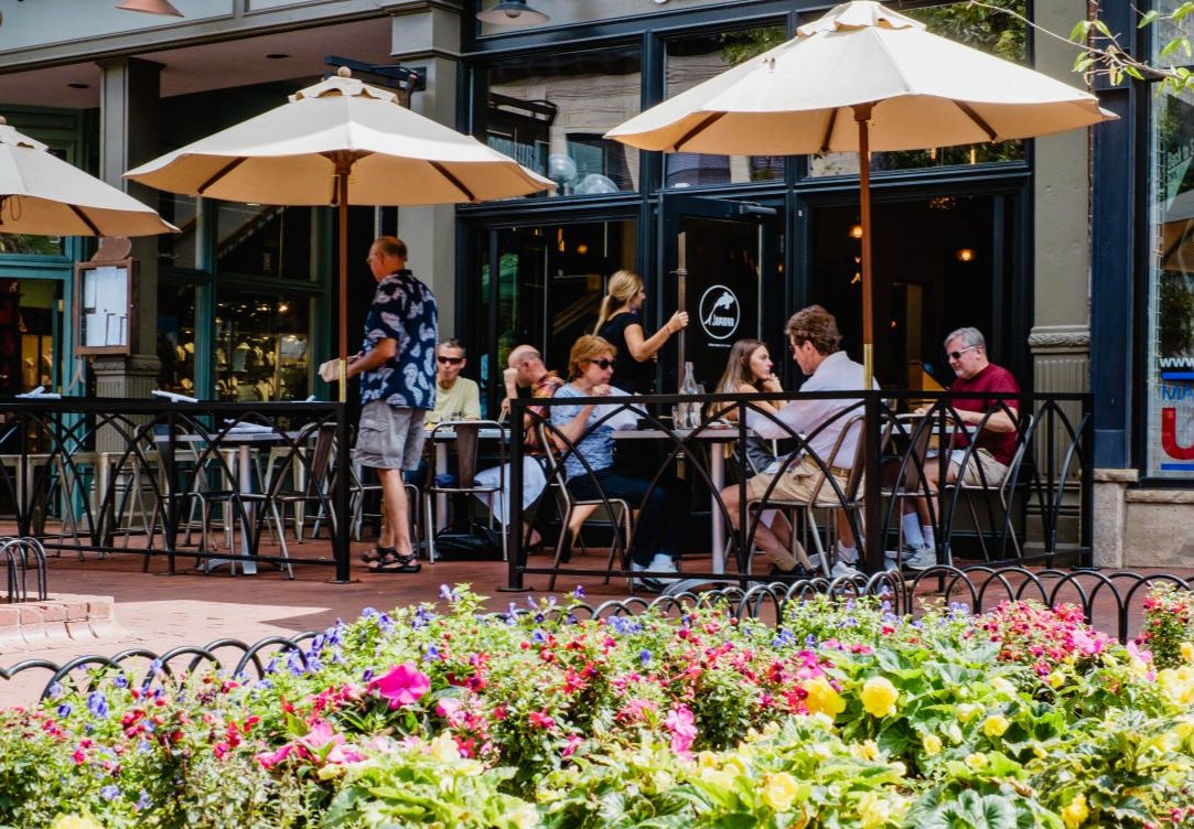 Outdoor dining in Boulder with seasonal food and drinks.