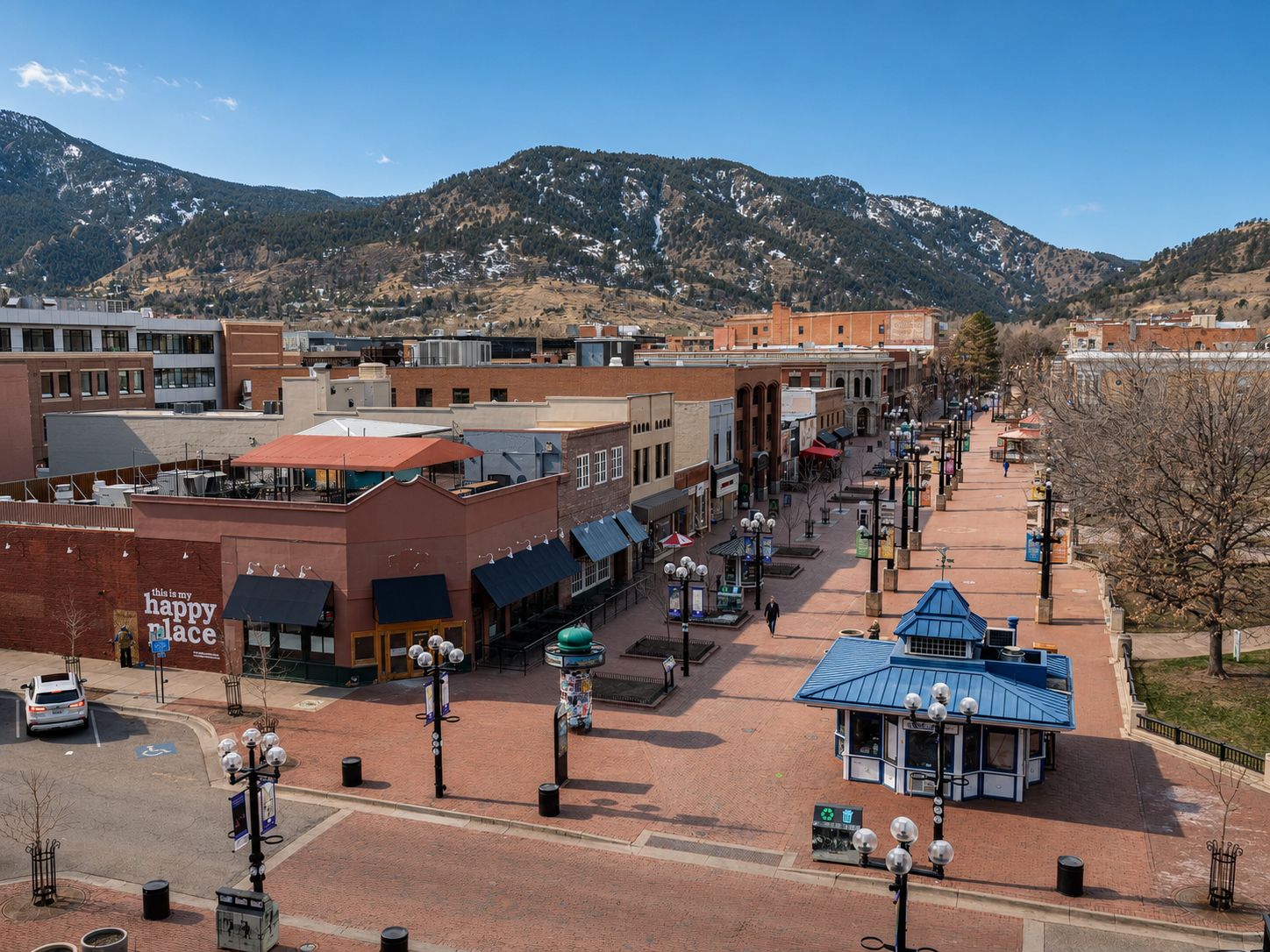 Pearl Street Mall pedestrian corridor in downtown Boulder, Colorado surrounded by local shops, restaurants, and nearby residential neighborhoods
