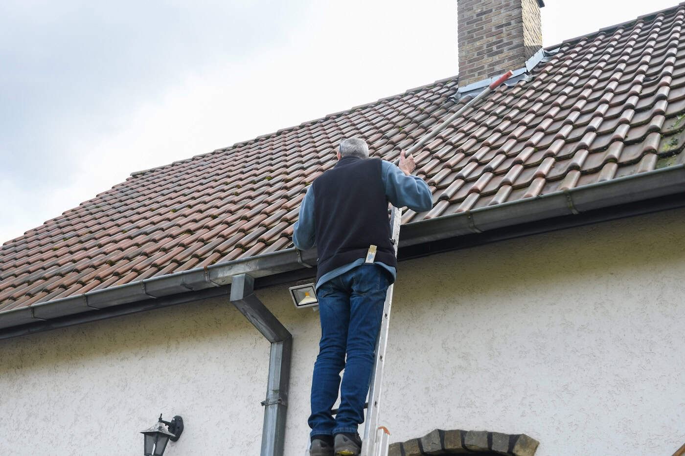 Inspector checking the exterior of a Boulder County home