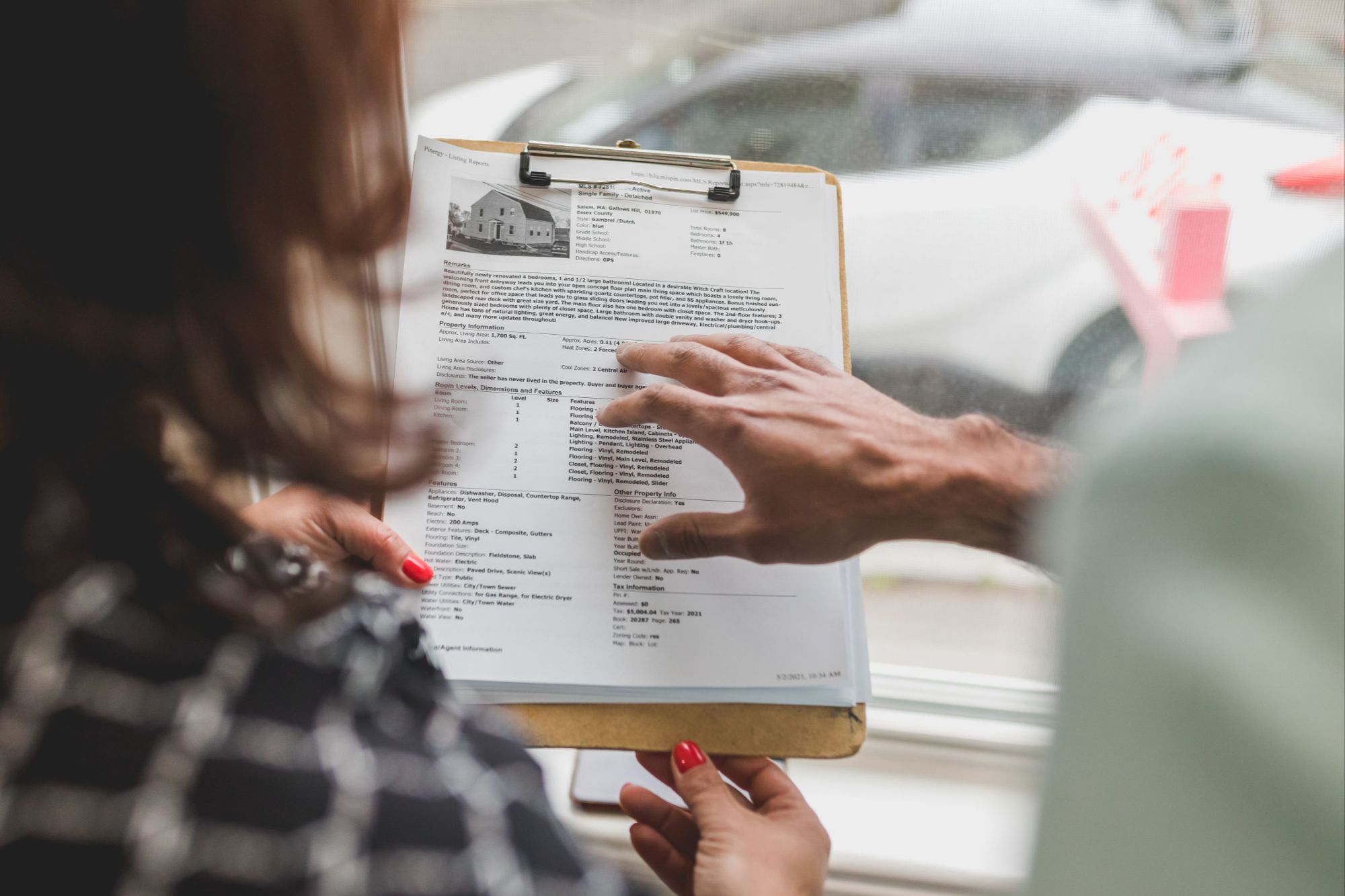 Home buyer reviewing mortgage costs for a Boulder Colorado property