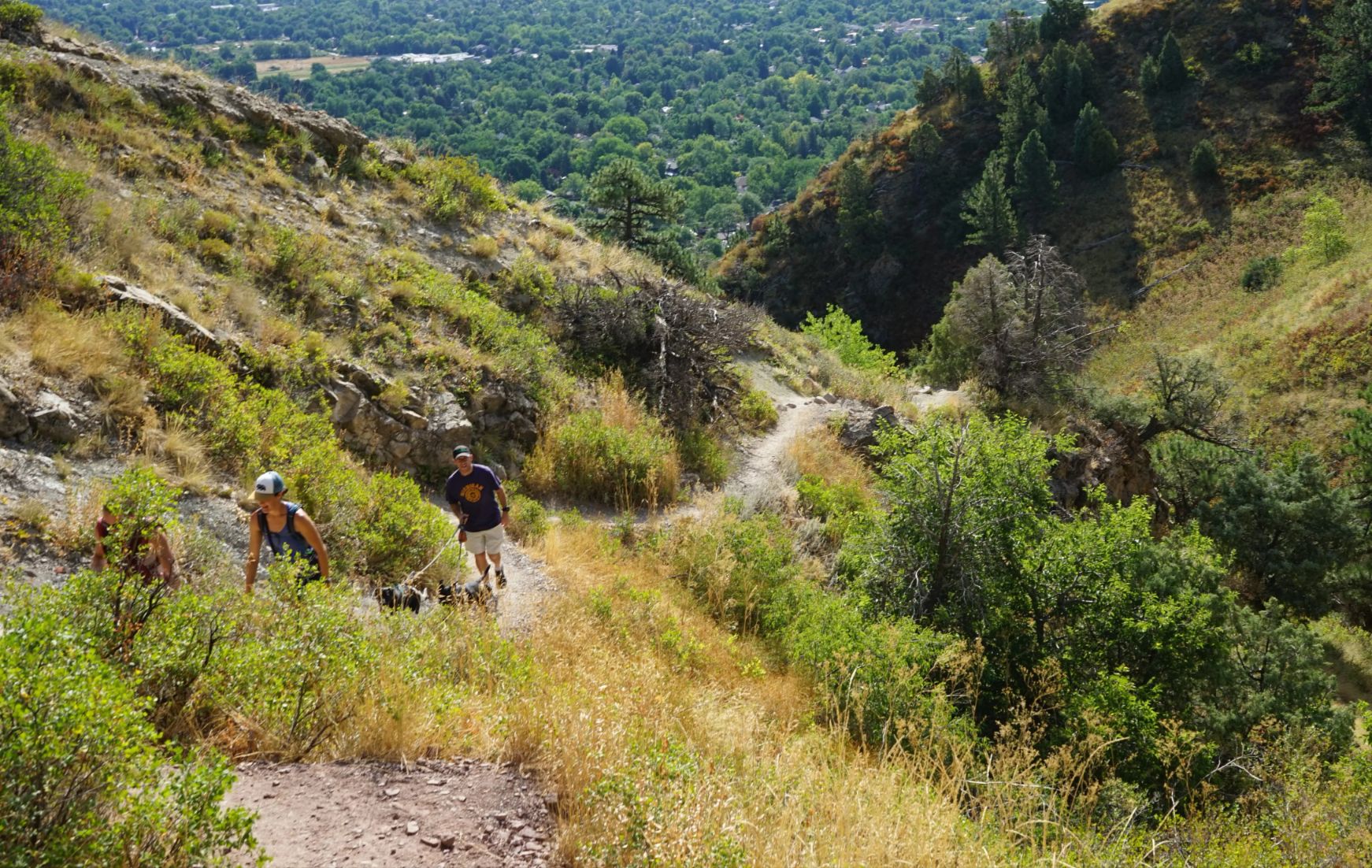 Couple hiking an approachable trail near the Flatirons in Boulder.