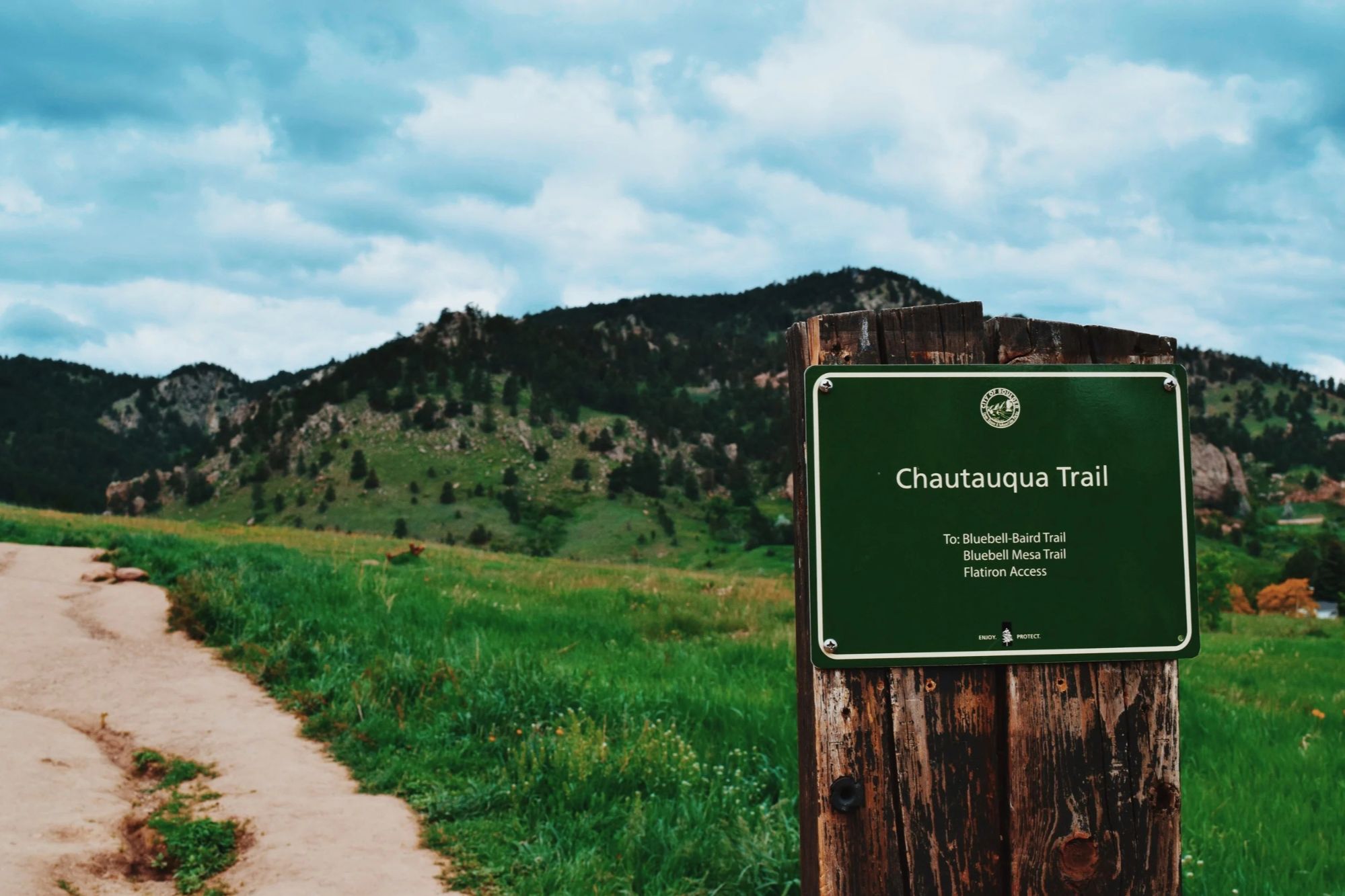 Easy walking trail through Chautauqua Meadow with the Flatirons rising above Boulder.