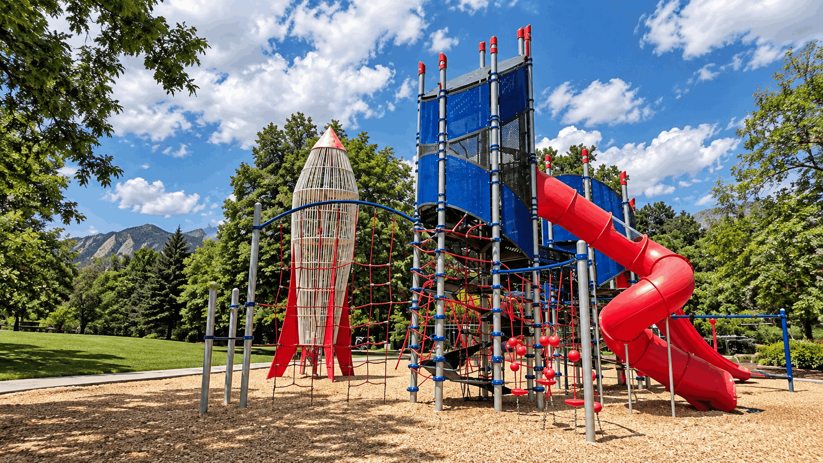 Rocket-themed playground and open park space at Scott Carpenter Park in Boulder, Colorado