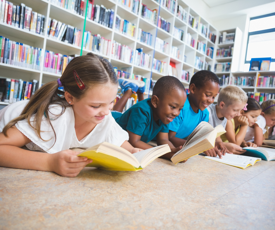Kids enjoying summer reading at local Mesa Arizona Library, a great kid-friendly summer activity. 