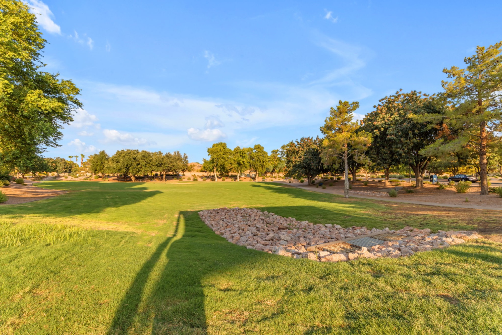 Walking path and landscaped greenbelt in a Gilbert HOA community