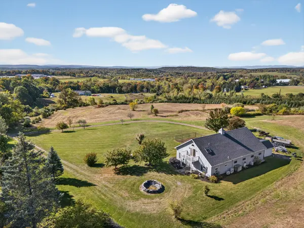 Barndominium on 3+ acres looking toward the additional 4+ acre lot