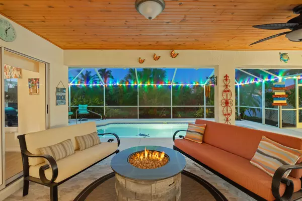 Inviting Southwest Florida lanai and poolside living — storytelling-driven real estate marketing.
