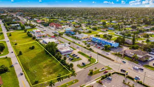Aerial view of commercial land parcel in Southwest Florida ready for development.