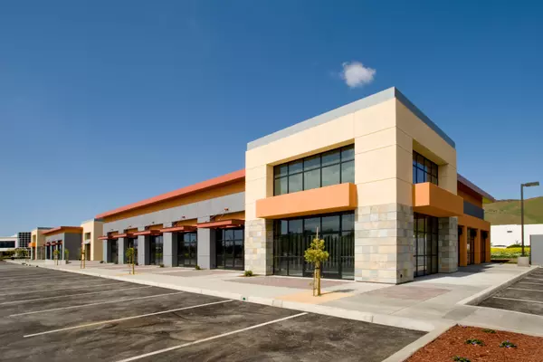 Modern commercial building exterior — supporting businesses through lease negotiation.