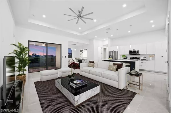 Open concept living room in Cape Coral new construction home at 1623 NW 17th St