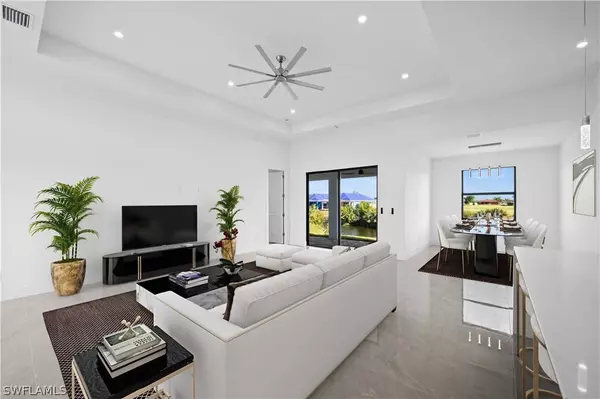 Open concept living room in Cape Coral new construction home at 1623 NW 17th St