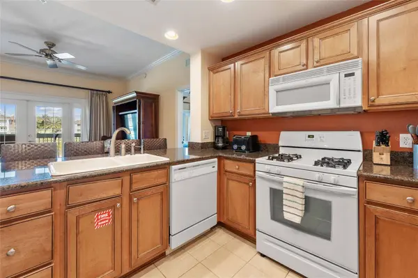 1597 HERITAGE CROSSING CT #302, Reunion, FL 34747
