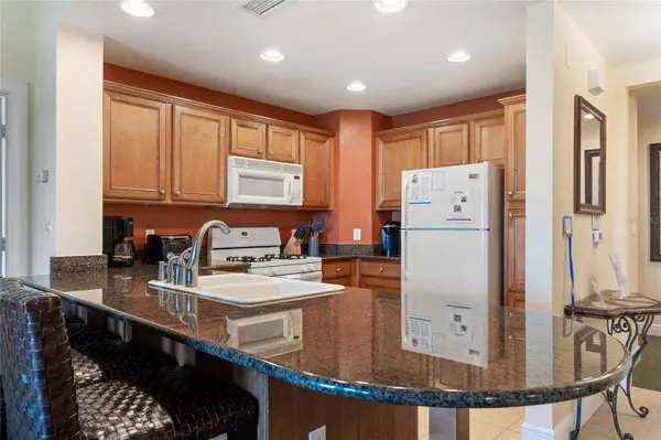 1597 HERITAGE CROSSING CT #302, Reunion, FL 34747