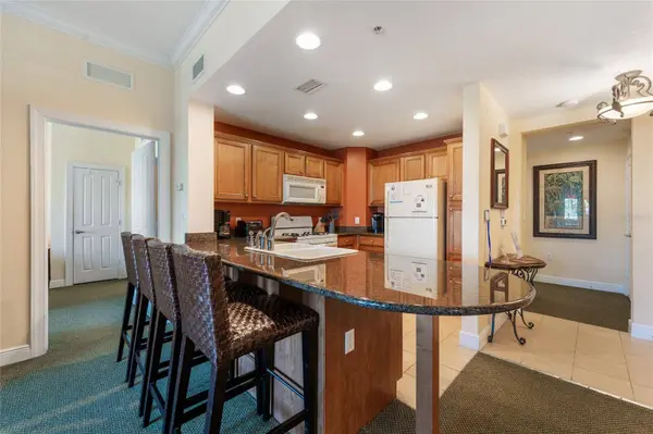 1597 HERITAGE CROSSING CT #302, Reunion, FL 34747