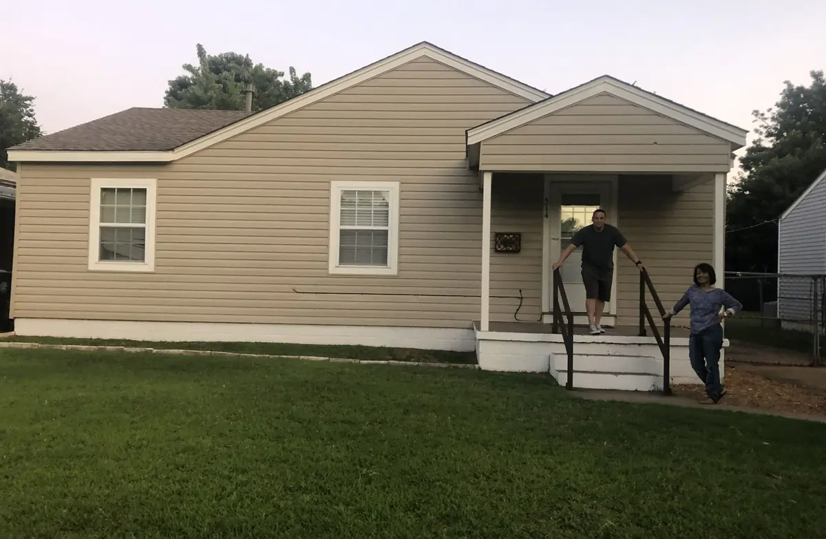 Realtor Mike Jones at his first investment property, a rental home he bought in 2019