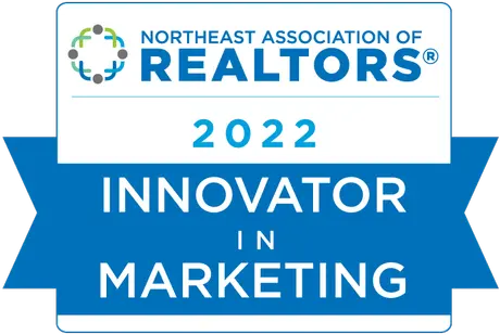 Stephanie Saunders, REALTOR®, receiving the Innovator In Marketing Award from the Northeast Association of REALTORS® in 2022 and 2023, recognizing excellence in creative and effective real estate marketing.