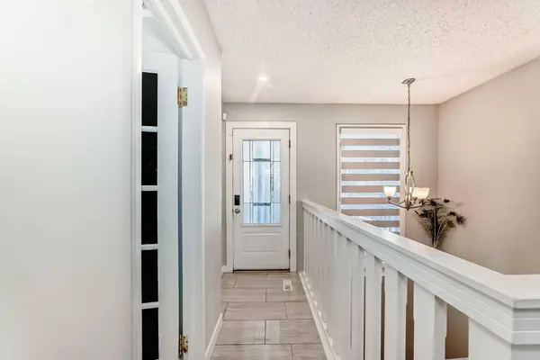 303 Coach Side RD SW, Calgary, AB T3H 1C7