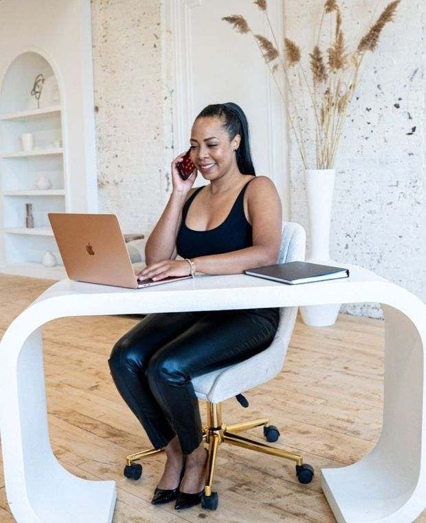 Donalta Hall on a call with a relocation client