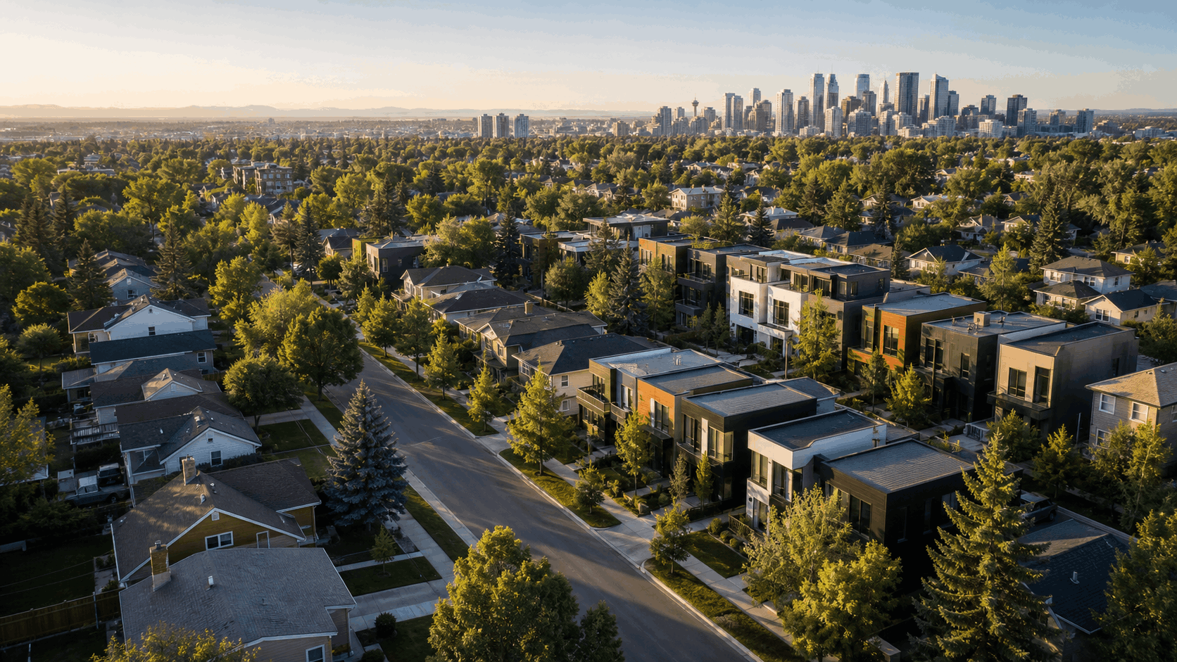 Aerial view of detached homes and gentle-density housing in an established Calgary neighbourhood
