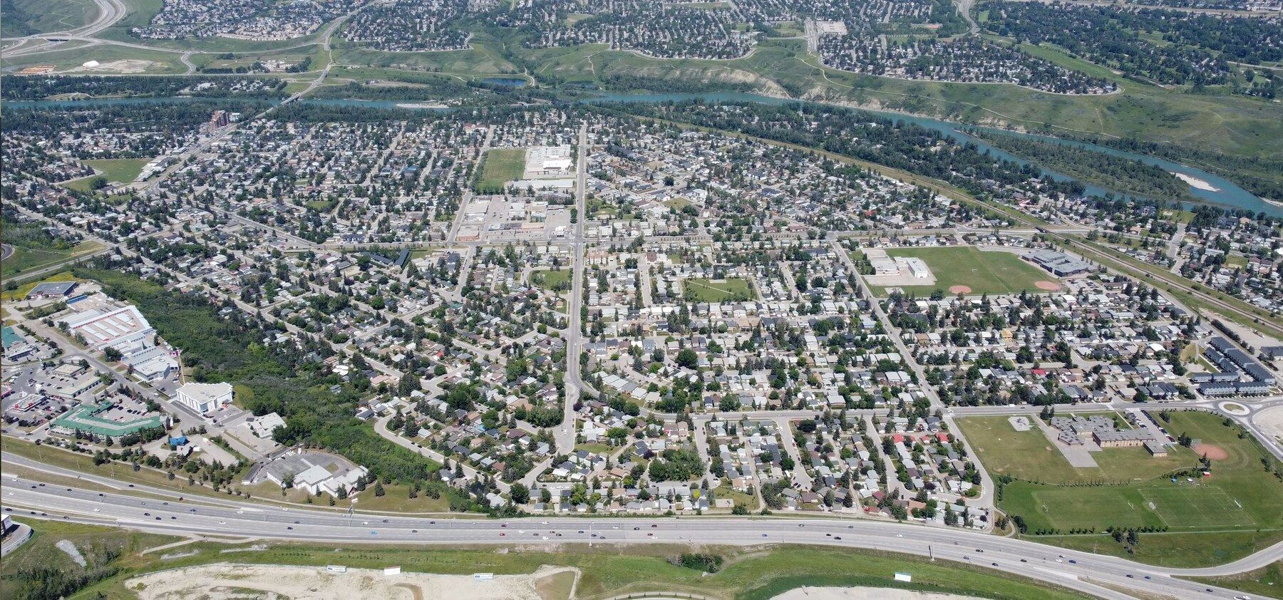 Aerial photograph of the Bowness community and Bow River in Calgary
