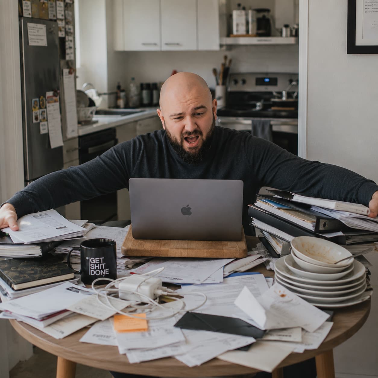 Working from a cluttered kitchen table