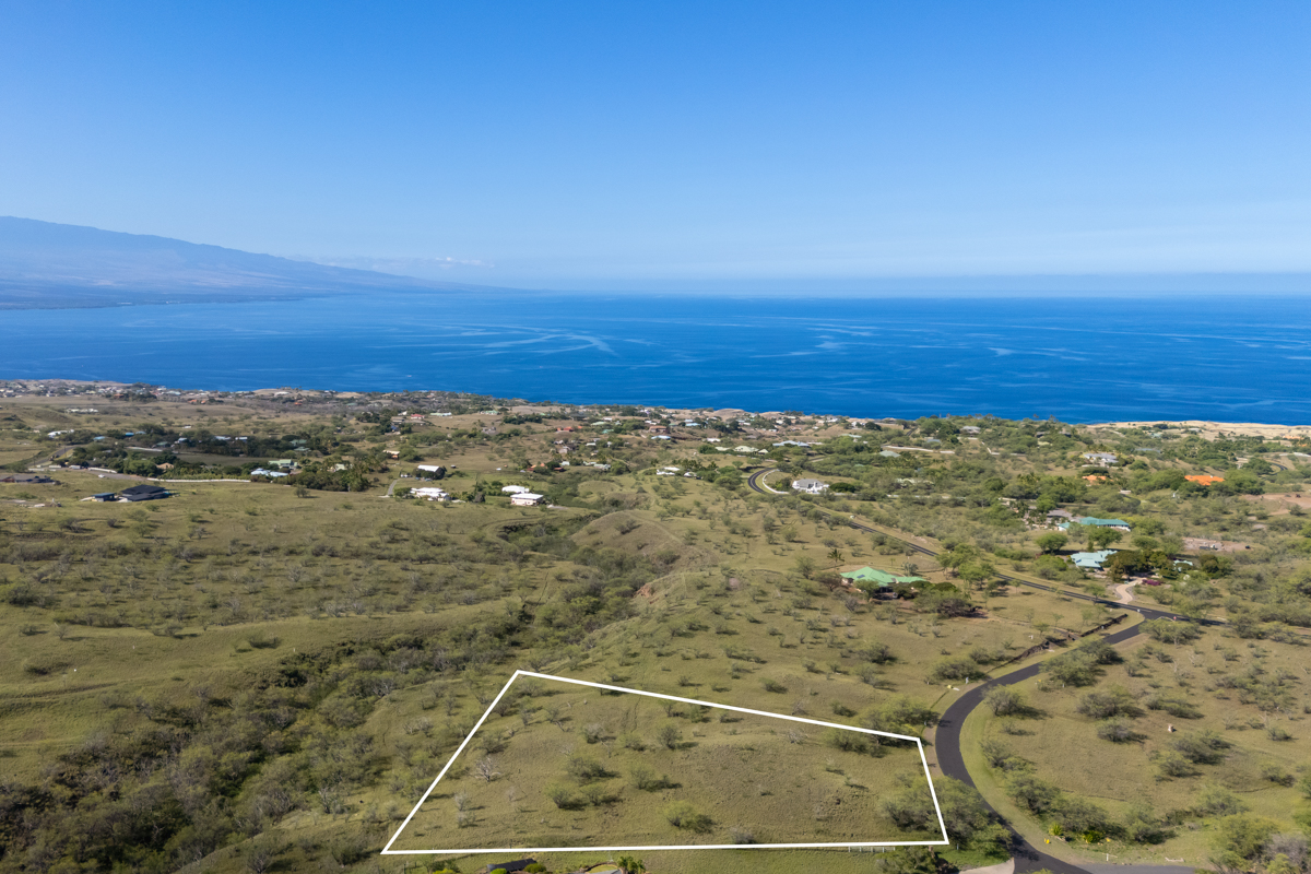 Aerial view of Lot #193 in the Heathers at Kohala Ranch on Hawaii&rsquo;s Big Island, overlooking the Pacific Ocean and the surrounding coastal community.