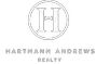 Hartmann Andrews Realty logo on black new