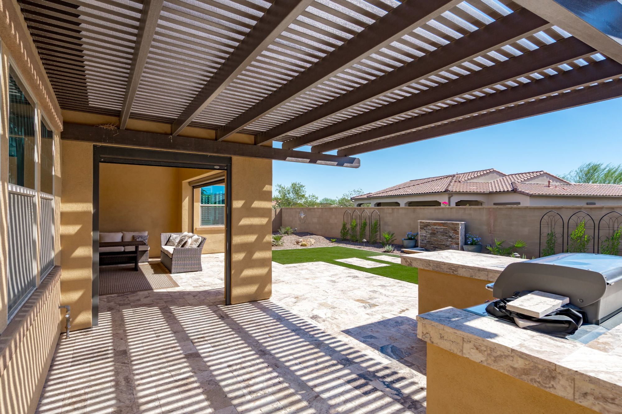 Enclosed patio with built-in barbecue in Buckeye, AZ
