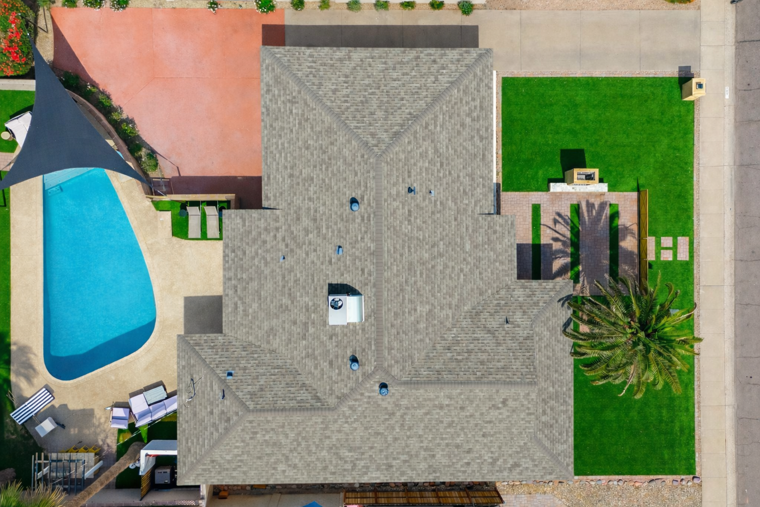 Top-down aerial view of a turnkey Old Town Scottsdale short-term rental home featuring a private pool, landscaped yard, expansive outdoor entertaining areas, and a fully furnished, income-producing vacation rental layout.
