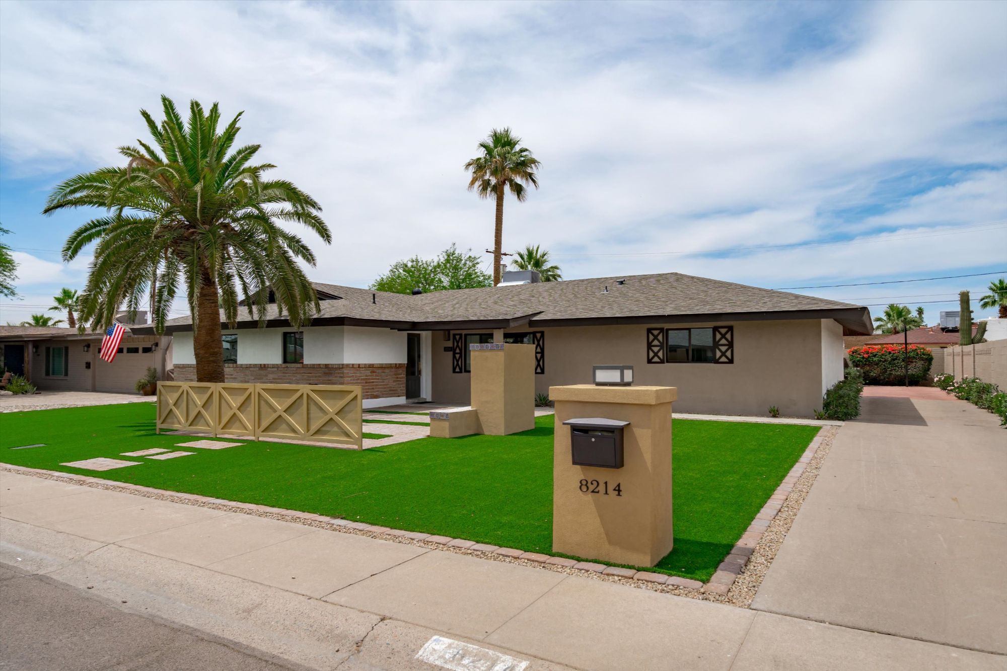 Front exterior of a turnkey Old Town Scottsdale vacation rental featuring low-maintenance landscaping, private entry, and a single-story layout ideal for investors, snowbirds, and part-time Arizona living.