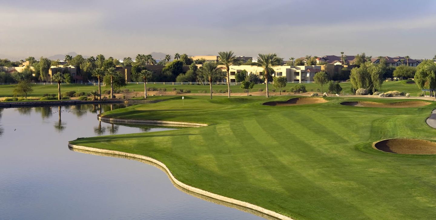 Palm Valley Golf Course Goodyear AZ featuring lakefront greens, luxury homes, and scenic desert views, highlighting high-demand West Valley real estate ideal for short-term rentals, golf communities, and investment properties in Goodyear, Peoria, and Glendale Arizona