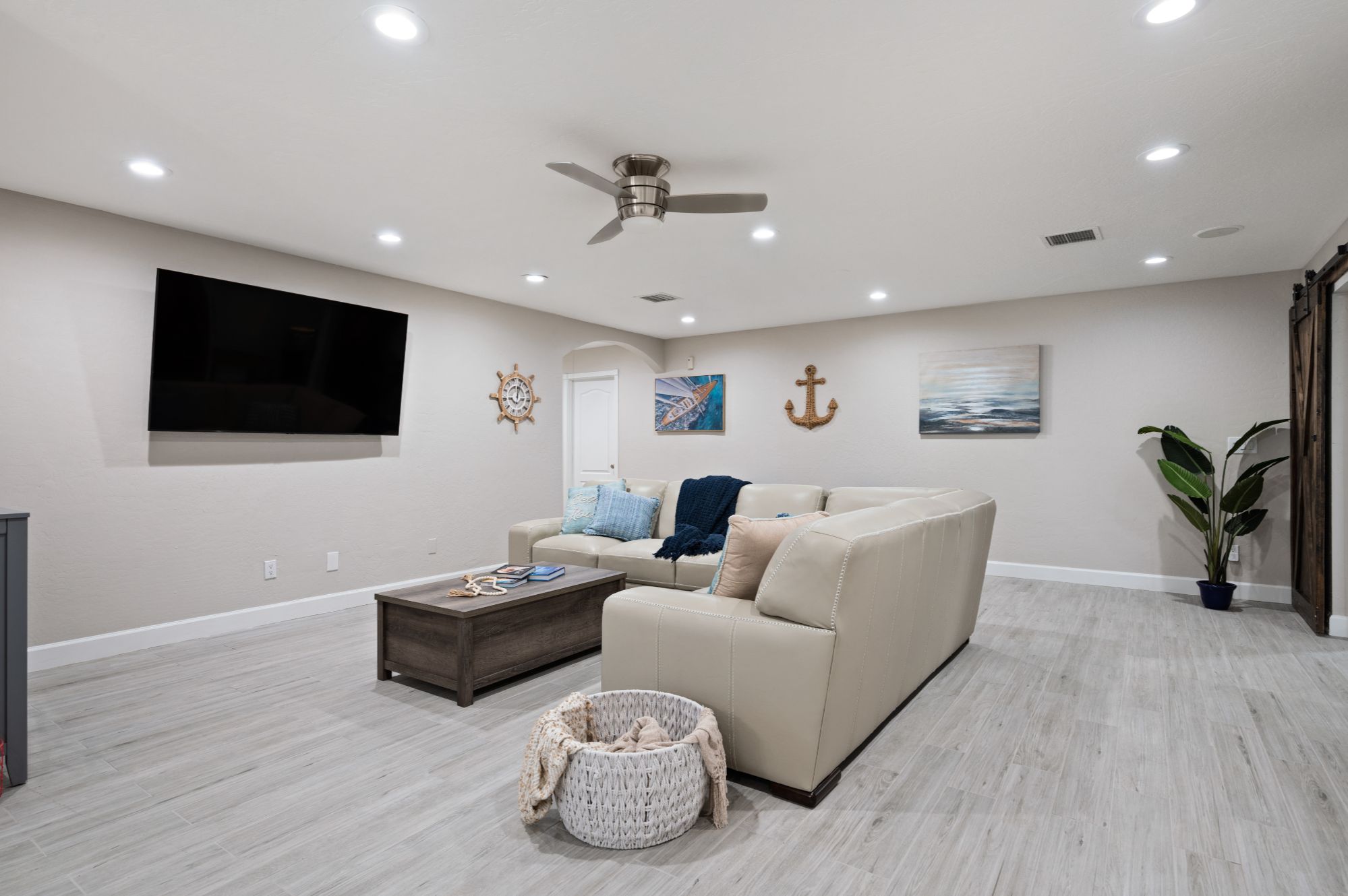Open concept Scottsdale home interior with modern flooring, spacious living area, and flexible layout ideal for short-term rental design, additional bedroom conversion, or game room setup near Old Town Scottsdale