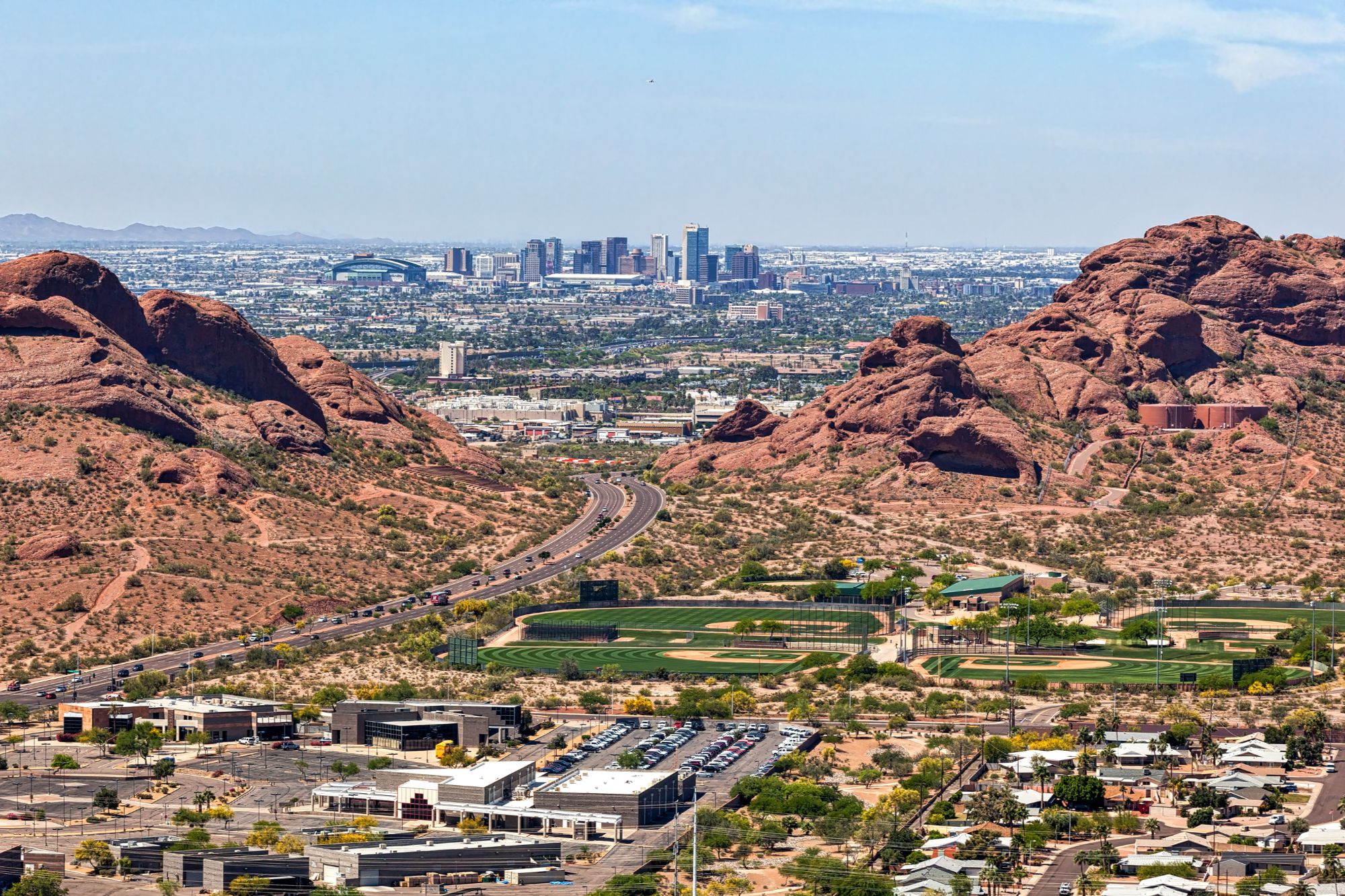 Central Phoenix Arizona skyline view from Papago Park with desert mountains, showcasing proximity to downtown, hiking, and high-demand real estate and short-term rental investment opportunities