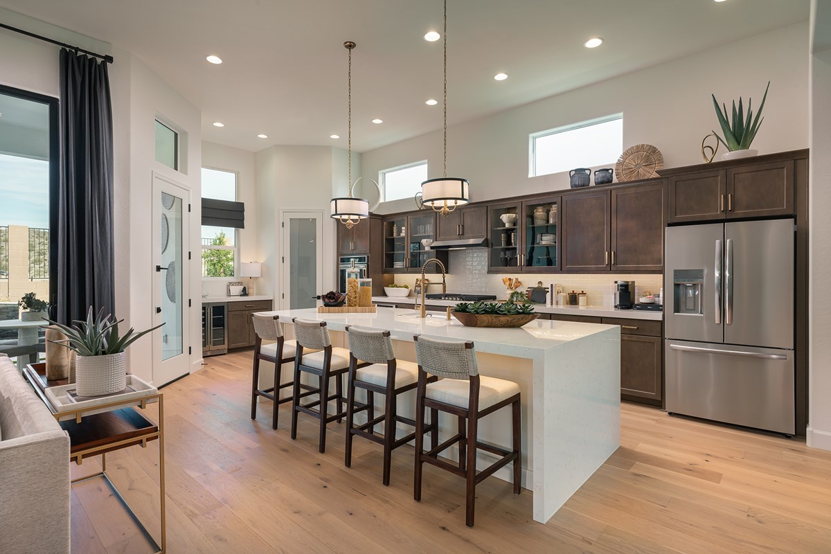 New construction model home interior Phoenix Arizona — luxury kitchen finishes new build