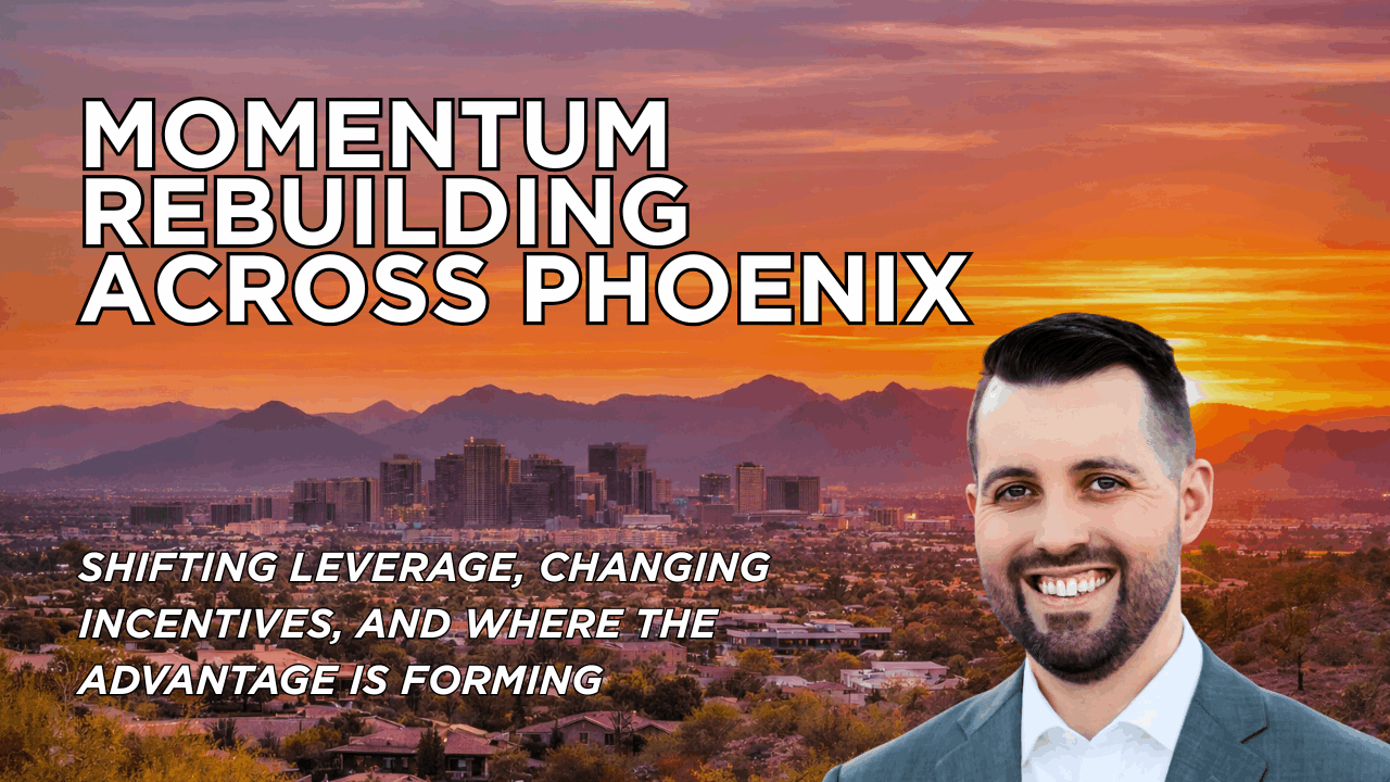 Eric Ravenscroft Phoenix housing market update 2026 cover image featuring downtown Phoenix skyline at sunset with headline “Momentum Rebuilding Across Phoenix” highlighting shifting leverage, changing builder incentives, and Greater Phoenix real estate market trends.