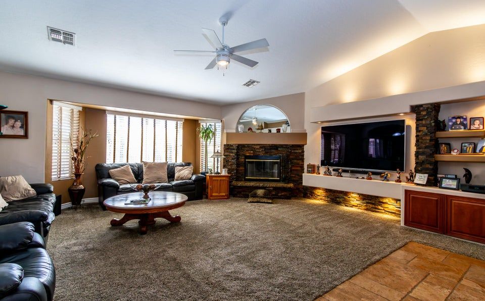 Living room before — empty vacant home Mesa AZ